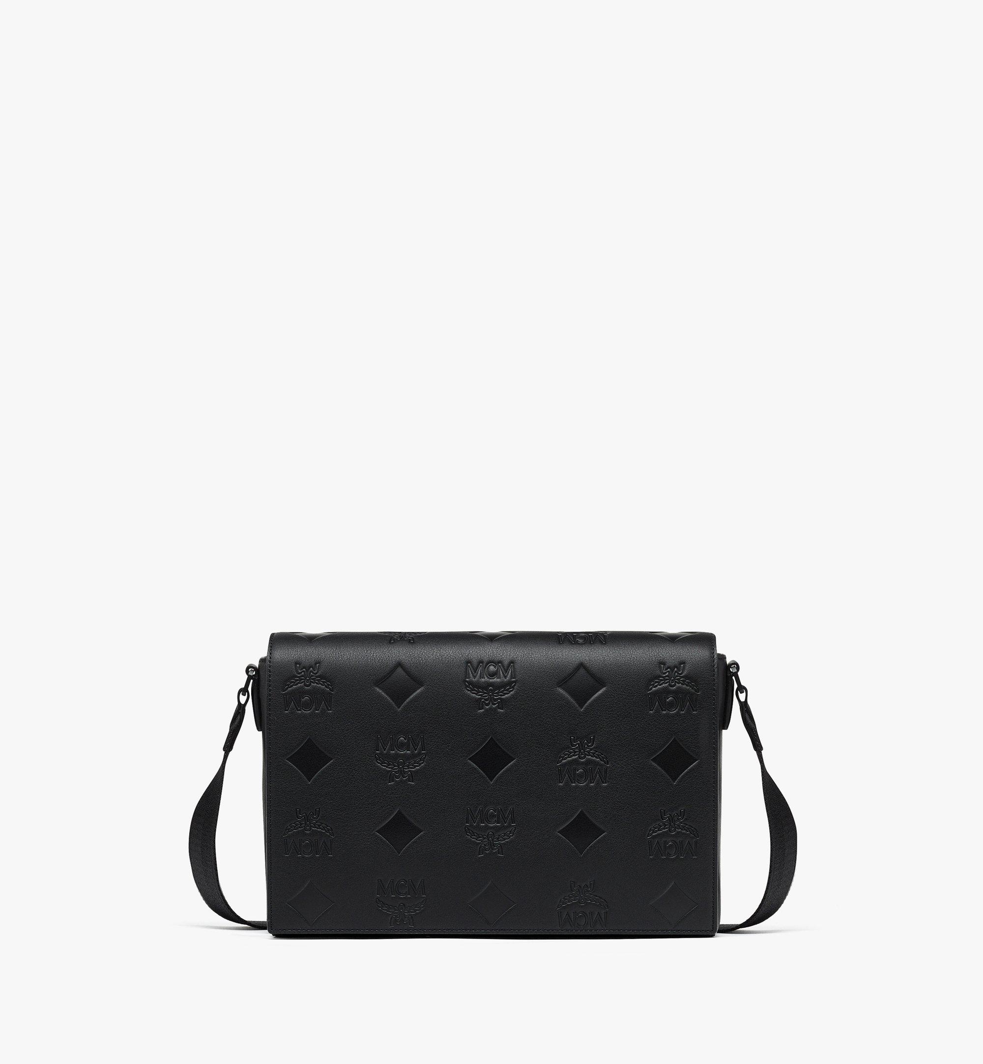 Mcm sling hotsell bag black